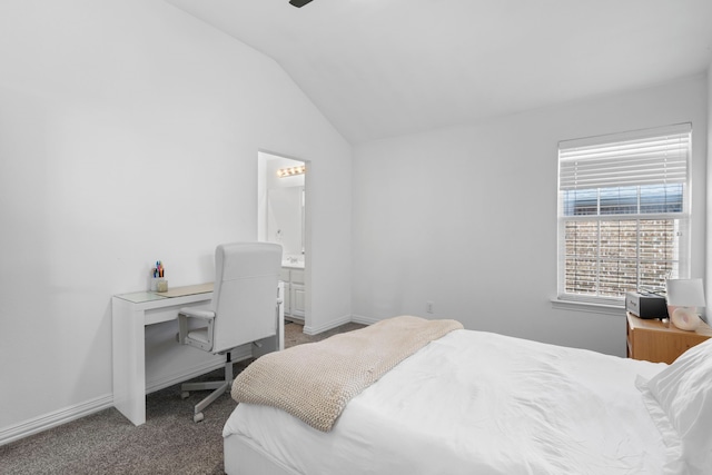 1891 Mustang Trl, Frisco, TX 75033 - carpeted bedroom with vaulted ceiling, a desk, and ensuite bath
