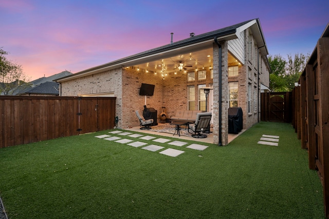 1891 Mustang Trl, Frisco, TX 75033 - rear view of house featuring a gate, a patio, a fenced backyard, and a ceiling fan