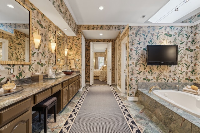 ensuite bathroom with crown molding, a bath, baseboards, wallpapered walls, and double vanity