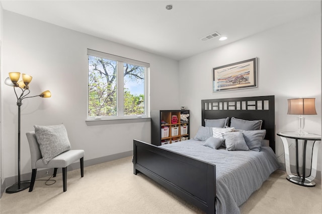 276 Currie St, Fort Worth, TX 76107 - bedroom featuring light colored carpet, baseboards, and visible vents