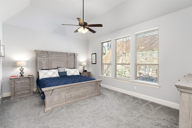 bedroom featuring baseboards, a ceiling fan, and carpet flooring