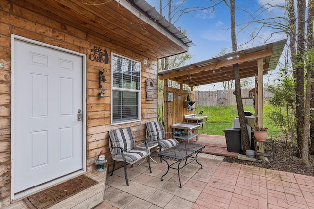 view of patio / terrace with fence