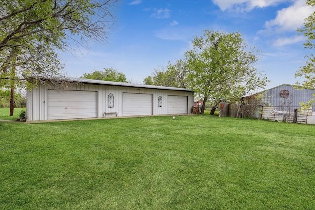 detached garage with fence