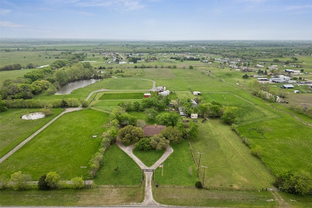 aerial view featuring a water view and a rural view