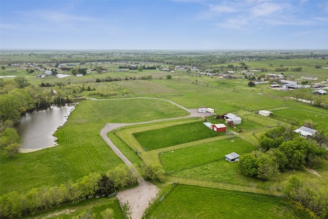 bird's eye view with a water view and a rural view