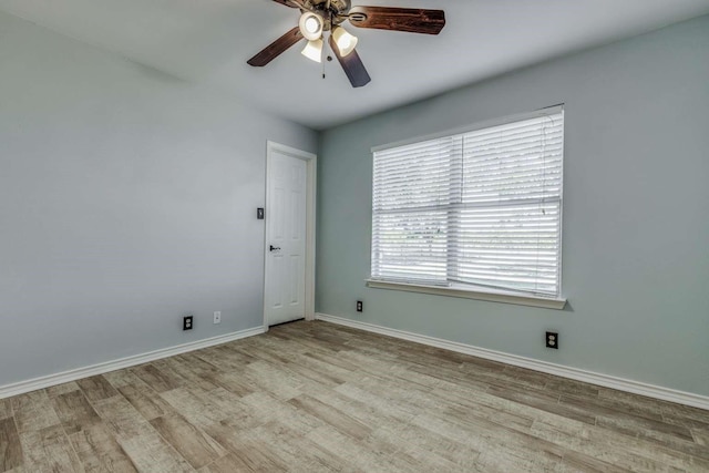 845 County Road 490, Princeton, TX 75407 - empty room with baseboards, ceiling fan, and wood finished floors