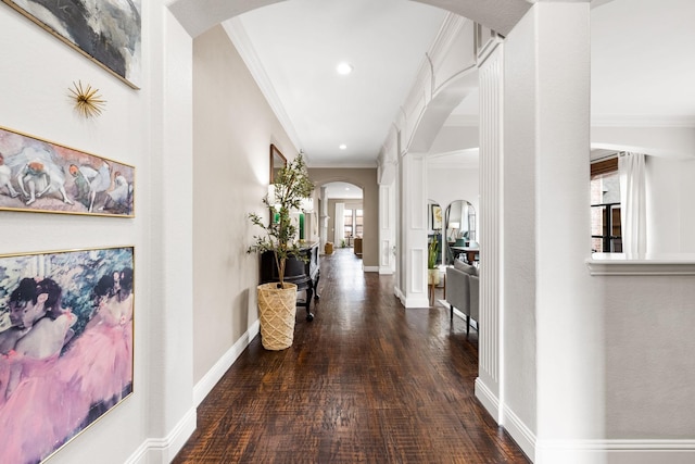 15596 Christopher Ln, Frisco, TX 75035 - corridor with crown molding, baseboards, arched walkways, and wood finished floors