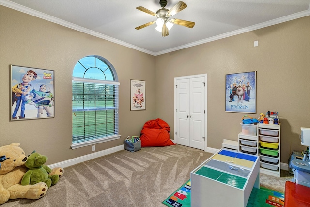 game room with ceiling fan, baseboards, crown molding, and carpet floors