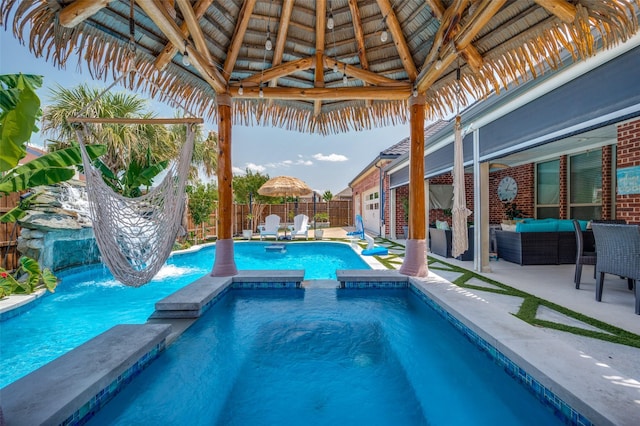 12532 Princess Dr, Frisco, TX 75035 - view of swimming pool featuring an outdoor hangout area, a fenced backyard, a pool with connected hot tub, and a patio