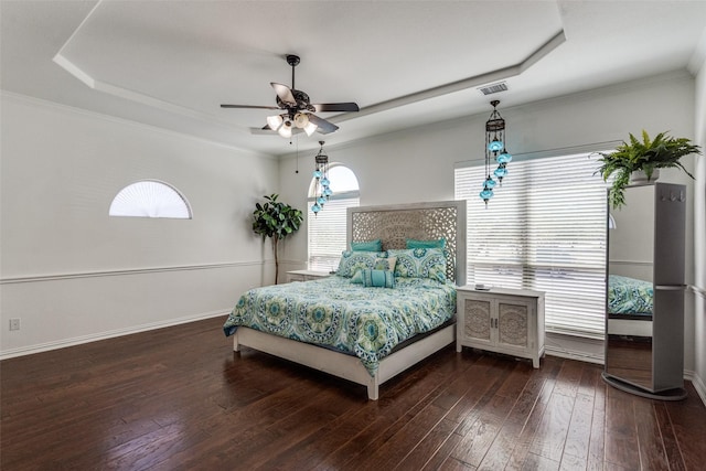 12532 Princess Dr, Frisco, TX 75035 - bedroom featuring a tray ceiling, hardwood / wood-style floors, a ceiling fan, and baseboards