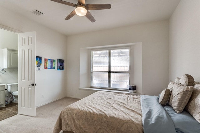 12532 Princess Dr, Frisco, TX 75035 - bedroom featuring light colored carpet, baseboards, ceiling fan, and connected bathroom