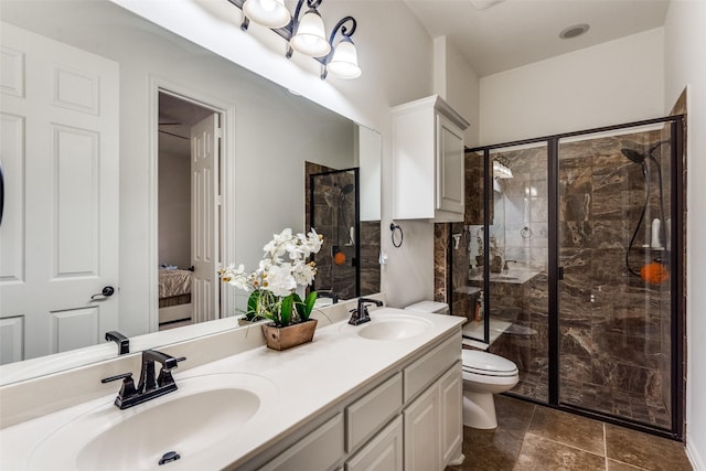 12532 Princess Dr, Frisco, TX 75035 - ensuite bathroom featuring toilet, double vanity, and a stall shower