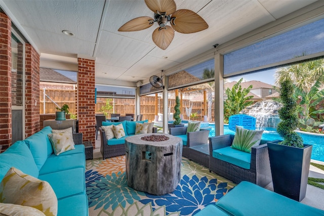 12532 Princess Dr, Frisco, TX 75035 - sunroom / solarium featuring an outdoor living space with a fire pit and ceiling fan