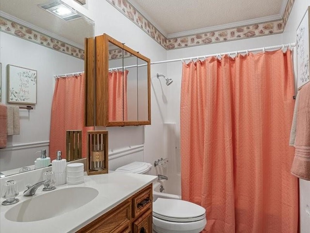 bathroom with shower / tub combo, toilet, ornamental molding, and vanity