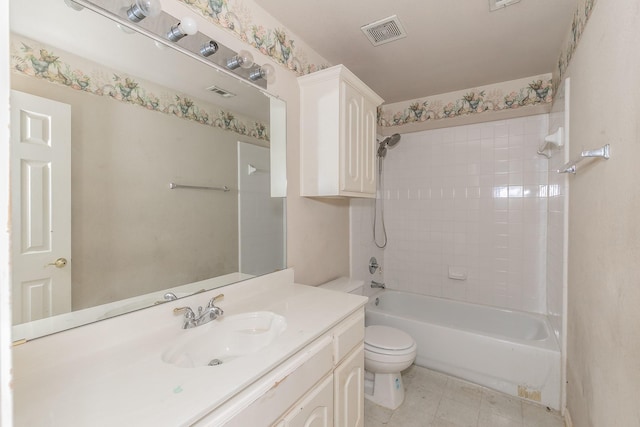 bathroom with toilet, shower / tub combination, visible vents, and vanity