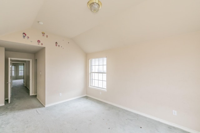4920 Marineway Dr, Fort Worth, TX 76135 - empty room with baseboards, vaulted ceiling, and light carpet