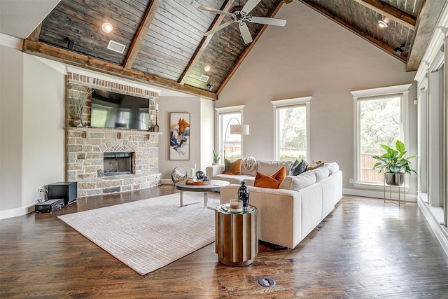 living room with high vaulted ceiling, beam ceiling, baseboards, and dark wood finished floors