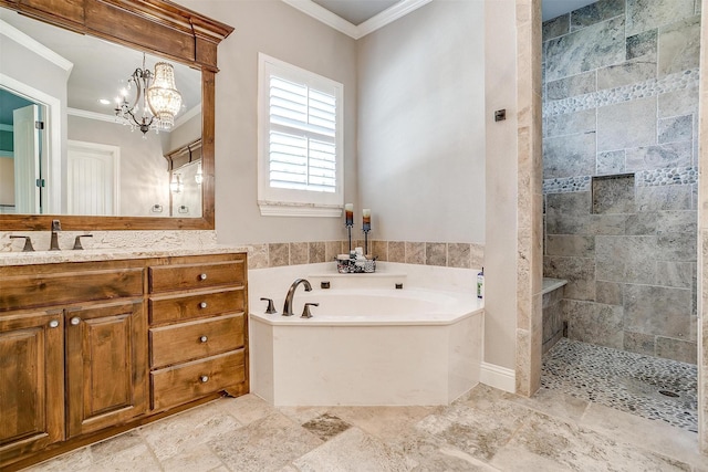 full bath featuring vanity, a notable chandelier, a garden tub, and crown molding