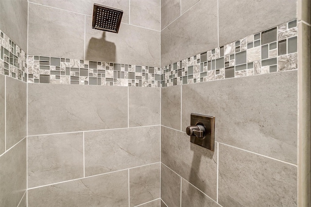 room details with a tile shower