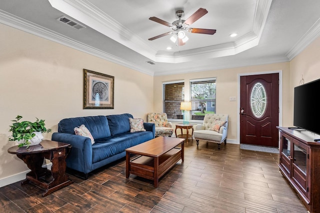 1321 S Montgomery St, Sherman, TX 75090 - living room with a raised ceiling, ceiling fan, crown molding, wood finished floors, and baseboards