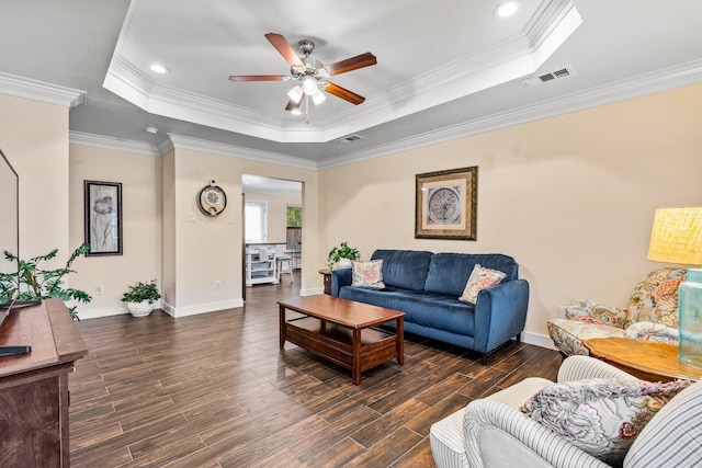 1321 S Montgomery St, Sherman, TX 75090 - living area with a tray ceiling, a ceiling fan, wood finished floors, baseboards, and ornamental molding