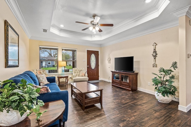 1321 S Montgomery St, Sherman, TX 75090 - living room featuring a tray ceiling, a ceiling fan, wood finished floors, baseboards, and ornamental molding