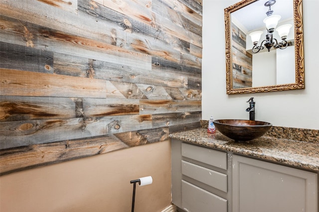 302 Comanche Dr, Gainesville, TX 76240 - interior space featuring a notable chandelier and vanity