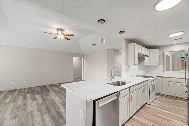 1581 Glenmore Dr, Lewisville, TX 75077 - kitchen with white electric stove, under cabinet range hood, dishwasher, and a textured ceiling