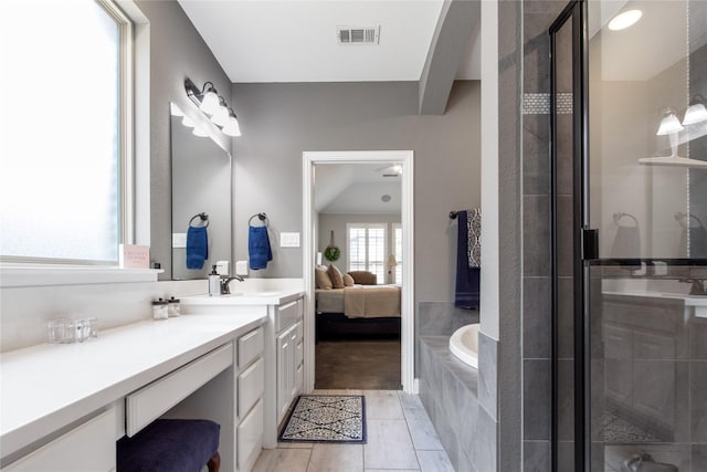 813 Pier St, Little Elm, TX 76227 - bathroom with a shower stall, connected bathroom, vanity, and a garden tub