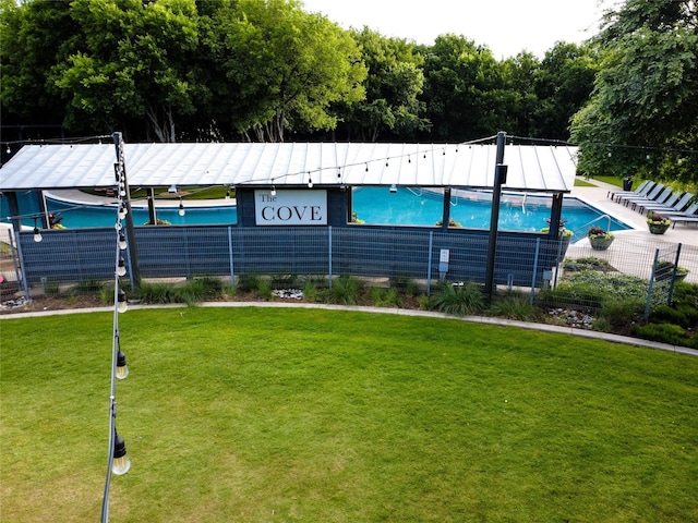 813 Pier St, Little Elm, TX 76227 - view of property featuring fence and a community pool