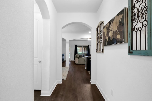 14649 Martin Creek Cv, Fort Worth, TX 76262 - hallway with wood finished floors, arched walkways, and baseboards