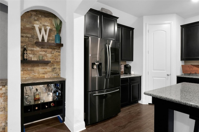 14649 Martin Creek Cv, Fort Worth, TX 76262 - kitchen featuring stainless steel refrigerator with ice dispenser, dark wood-style flooring, and dark cabinetry