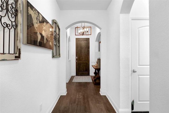 14649 Martin Creek Cv, Fort Worth, TX 76262 - corridor featuring wood finished floors, a chandelier, baseboards, and arched walkways