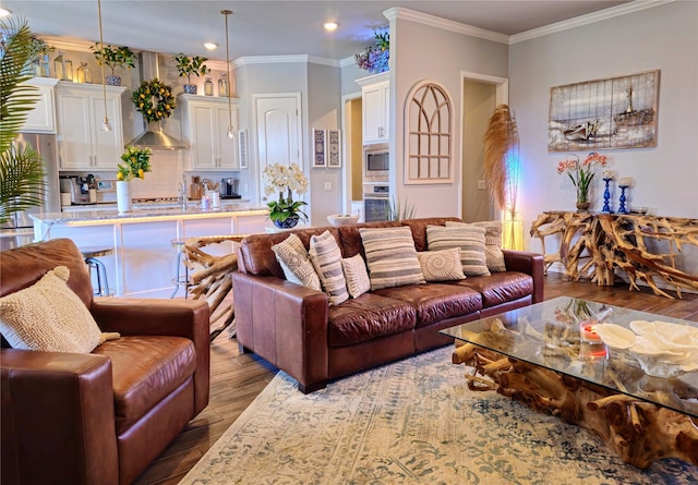 4805 Saddleback Ln, Wichita Falls, TX 73608 - living room featuring hardwood / wood-style flooring, ornamental molding, and recessed lighting