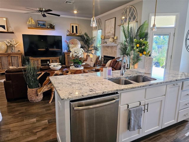 4805 Saddleback Ln, Wichita Falls, TX 73608 - kitchen featuring stainless steel dishwasher, open floor plan, a sink, a fireplace, and ornamental molding