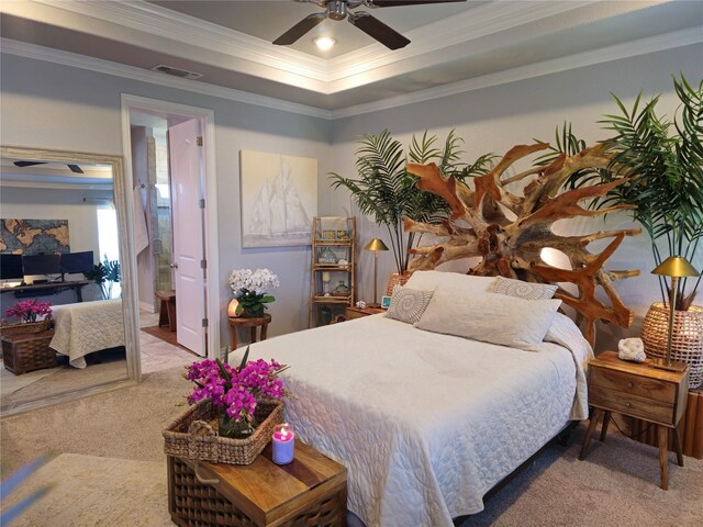 4805 Saddleback Ln, Wichita Falls, TX 73608 - bedroom with carpet floors, crown molding, a raised ceiling, a ceiling fan, and ensuite bathroom