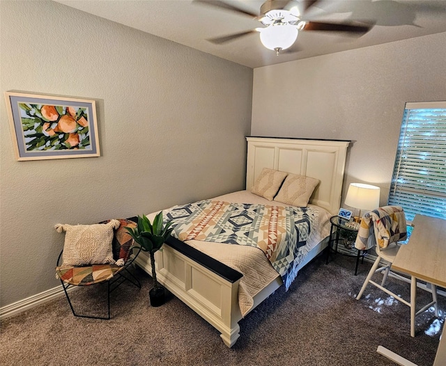 4805 Saddleback Ln, Wichita Falls, TX 73608 - bedroom featuring dark colored carpet, a ceiling fan, and a textured wall