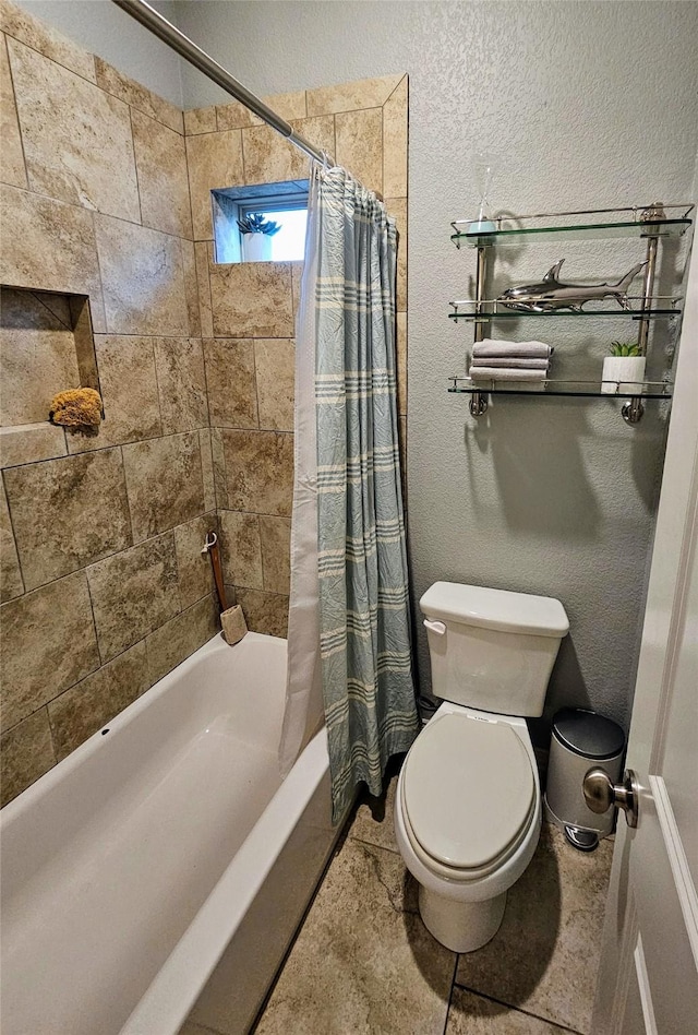 4805 Saddleback Ln, Wichita Falls, TX 73608 - bathroom featuring shower / bath combo and toilet