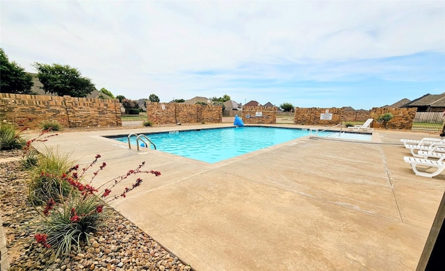 4805 Saddleback Ln, Wichita Falls, TX 73608 - community pool with a patio