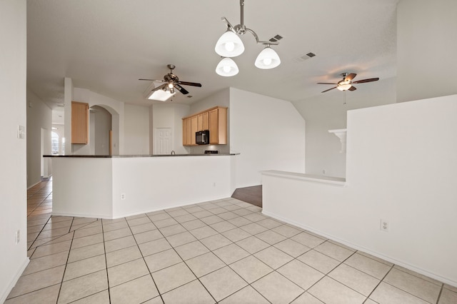 8329 Rolling Rock Dr, Fort Worth, TX 76123 - unfurnished living room featuring arched walkways, visible vents, light tile patterned floors, and ceiling fan with notable chandelier