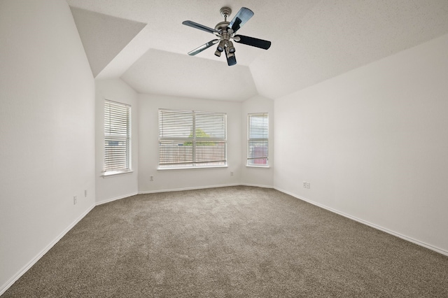 8329 Rolling Rock Dr, Fort Worth, TX 76123 - empty room featuring baseboards, carpet, a ceiling fan, and lofted ceiling