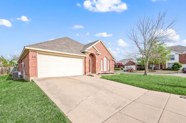 8329 Rolling Rock Dr, Fort Worth, TX 76123 - view of front of home with a garage, driveway, a front lawn, and brick siding