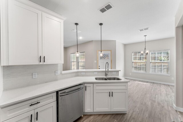 3504 Keyridge Dr, Dallas, TX 75241 - unfurnished dining area featuring a chandelier, light wood finished floors, and baseboards