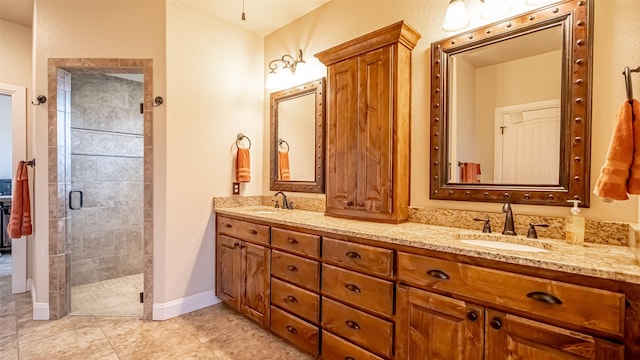 169 Star Point Ln, Weatherford, TX 76088 - full bath with double vanity, a sink, a stall shower, and baseboards
