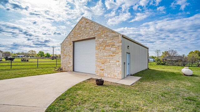 169 Star Point Ln, Weatherford, TX 76088 - detached garage with concrete driveway and fence