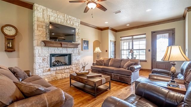 169 Star Point Ln, Weatherford, TX 76088 - living room with a ceiling fan, wood finished floors, crown molding, and visible vents