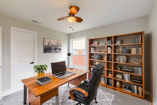 10503 Cayuga Dr, Dallas, TX 75228 - carpeted office with a ceiling fan