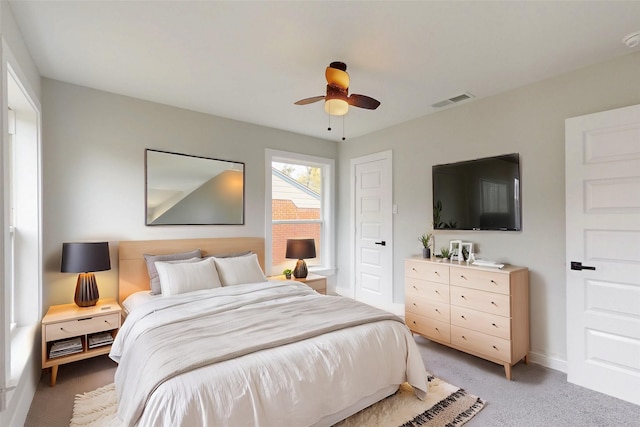 10503 Cayuga Dr, Dallas, TX 75228 - bedroom featuring light colored carpet, a ceiling fan, and baseboards