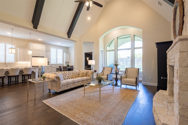 2813 Maverick Way, Celina, TX 75009 - living room featuring high vaulted ceiling, a ceiling fan, dark wood-type flooring, recessed lighting, and beamed ceiling