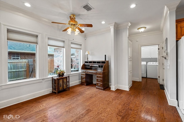 unfurnished office with ceiling fan, visible vents, ornamental molding, and wood finished floors